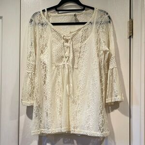 Medium cream two piece blouse.